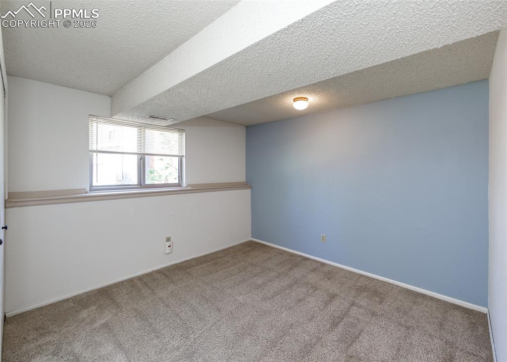 Image 24 of 34: Bedroom