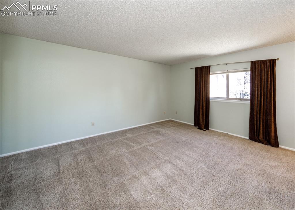 Image 28 of 34: Master Bedroom