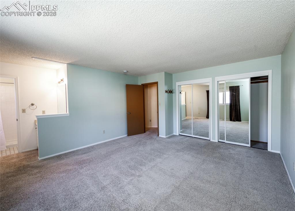 Image 29 of 34: Master Bedroom