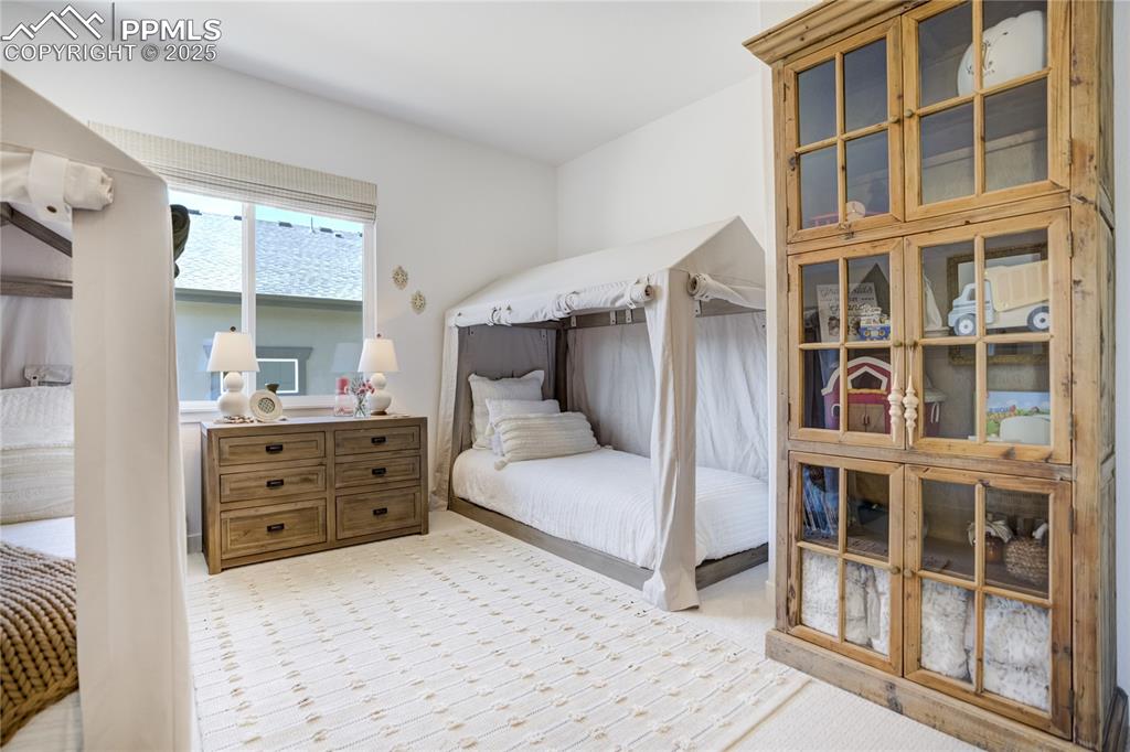 Image 24 of 50: Flex room on main w/double barn-door entry — office/playroom or bedroom