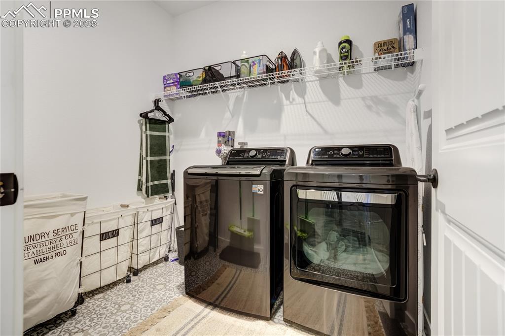 Image 25 of 50: Convenient main-level laundry room pre-plumbed for a future sink