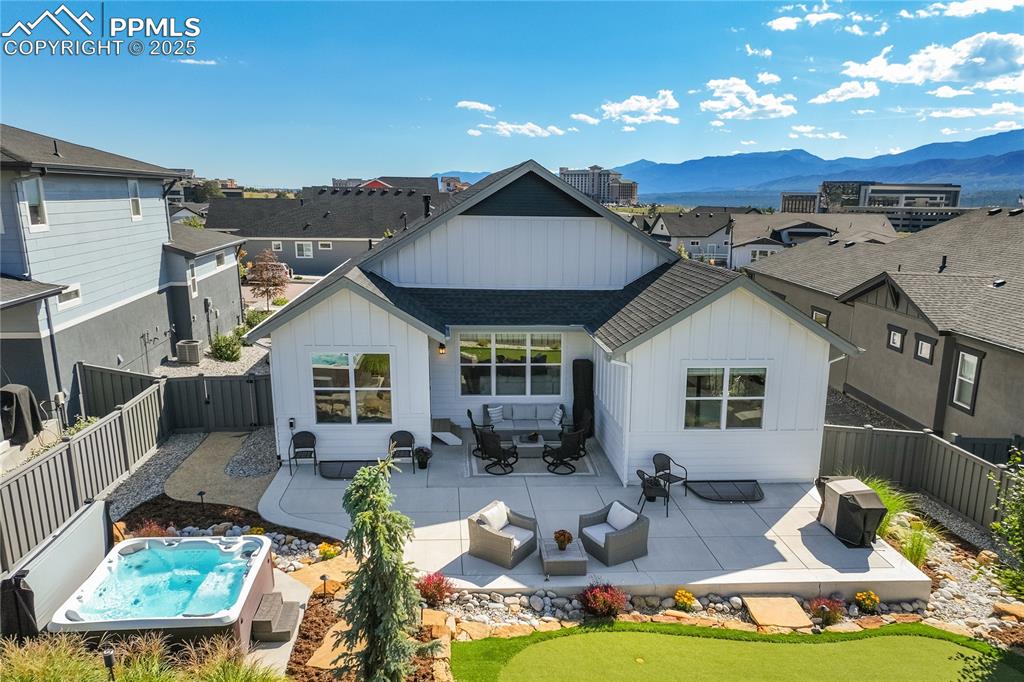 Image 41 of 50: Private, fenced 0.18-acre lot that lives as beautifully as the home