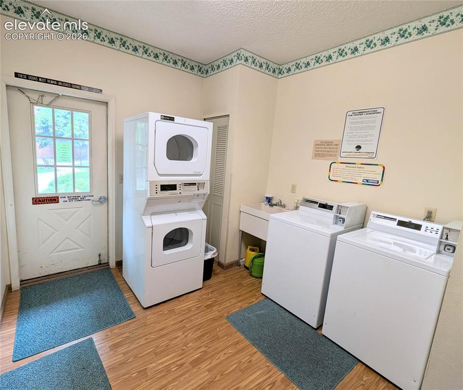 Image 28 of 29: Laundry available in clubhouse in addition to unit