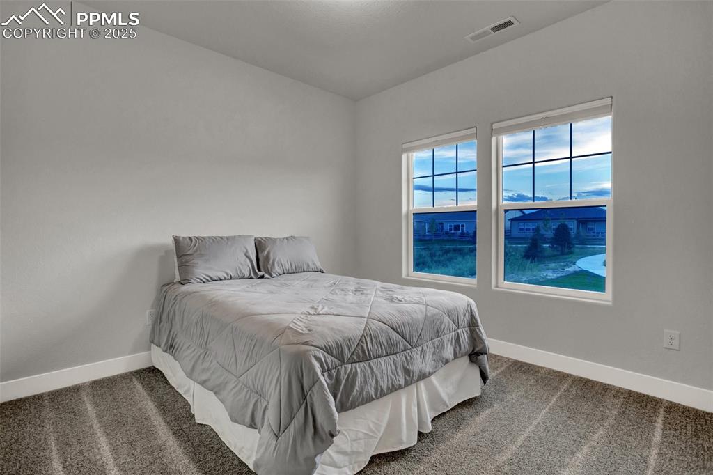 Image 23 of 34: 2nd bedroom 