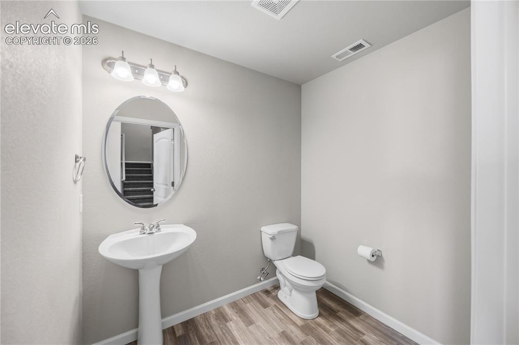 Image 17 of 44: main level guest bath