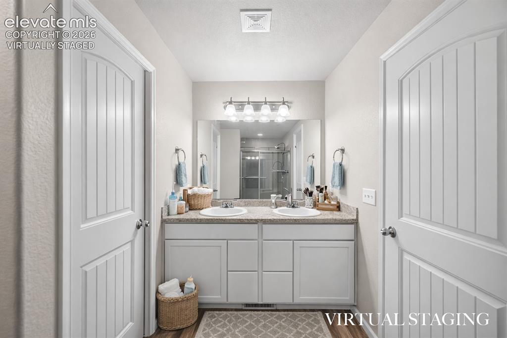 Image 23 of 44: Virtually Staged - double vanity