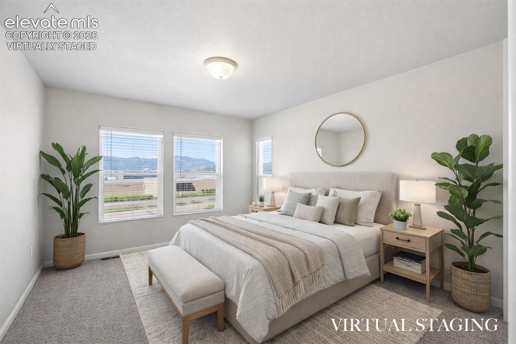 Image 26 of 44: Virtually Staged - Bedroom #2 with incredible mountain views