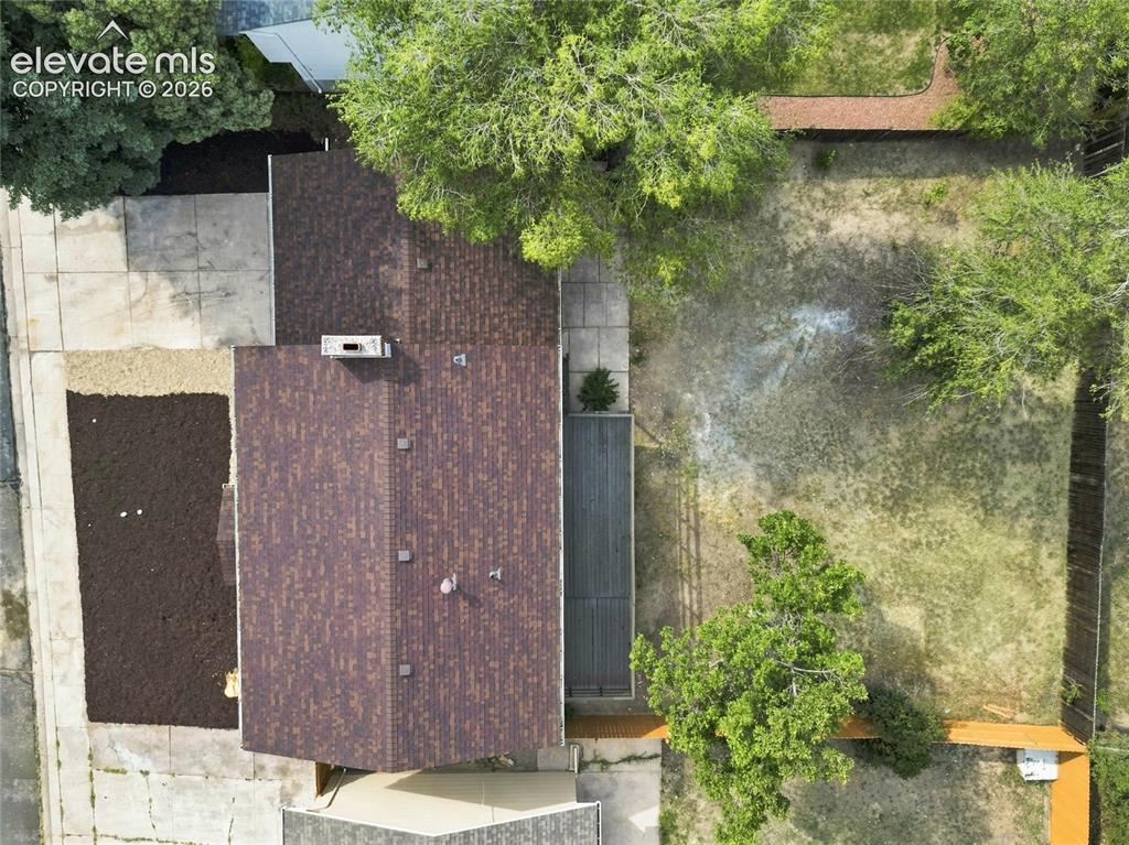 Image 27 of 30: Brown asphalt shingle roof