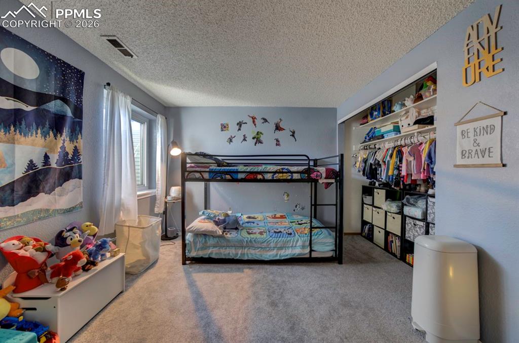 Image 40 of 50: Bedroom