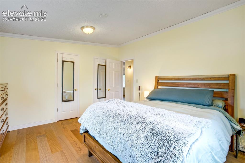 Image 22 of 50: Relaxing retreat with neutral tones and bright windows.