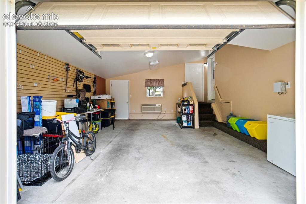 Image 38 of 50: Convenient interior stair access from the garage into the home adds everyda