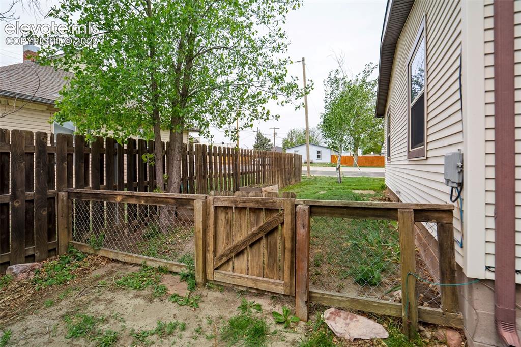 Image 45 of 50: Gated yard access.