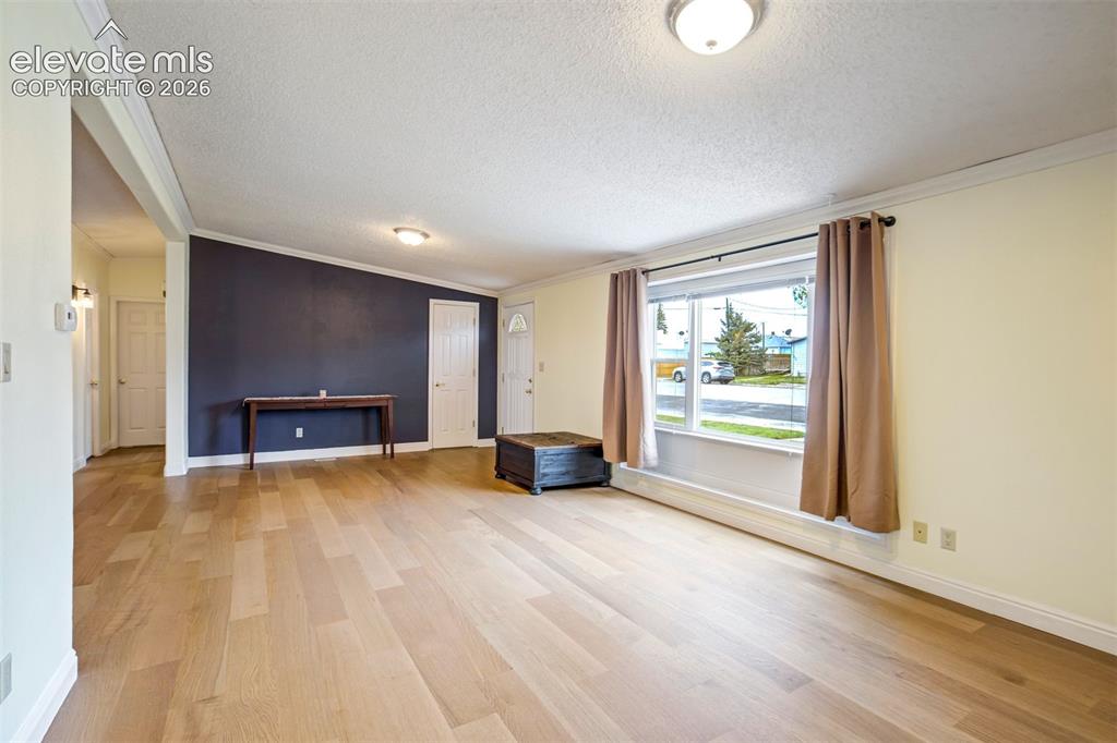 Image 9 of 50: Spacious open-concept living area.