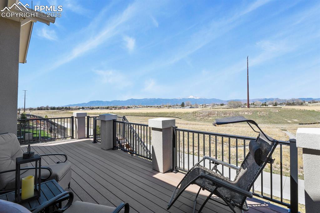 Image 43 of 50: Wooden terrace with a view of rural / pastoral area and a mountain view