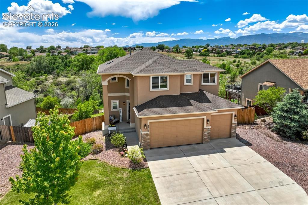 Image 1 of 47: Backs to Open Space, Mountain View from the deck, 4 car garage. Need we say