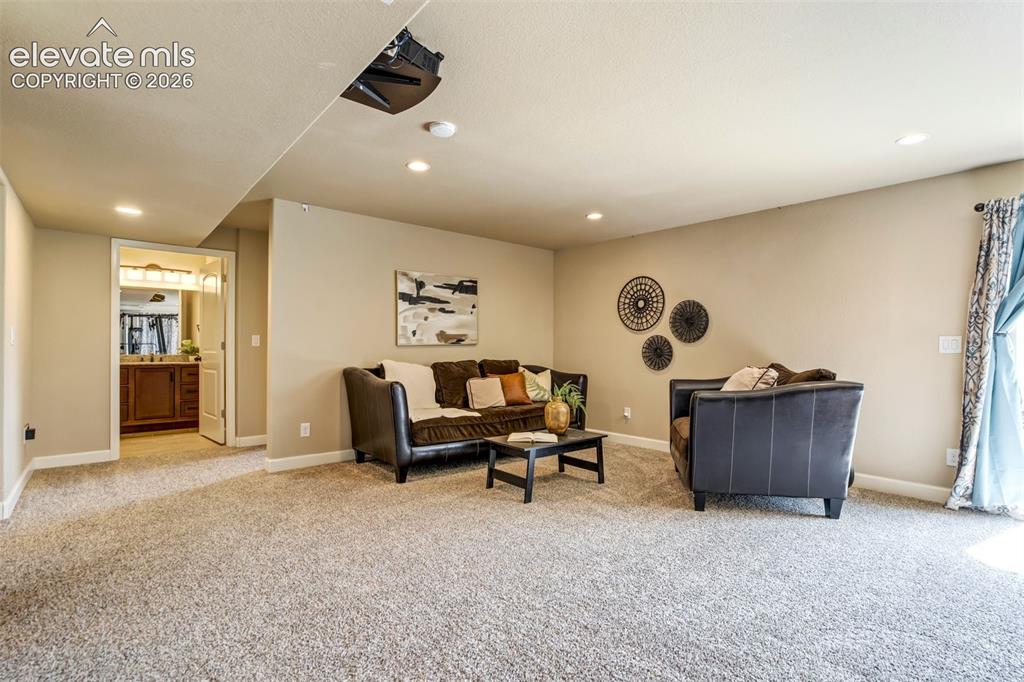 Image 33 of 47: A basement so bright and inviting you