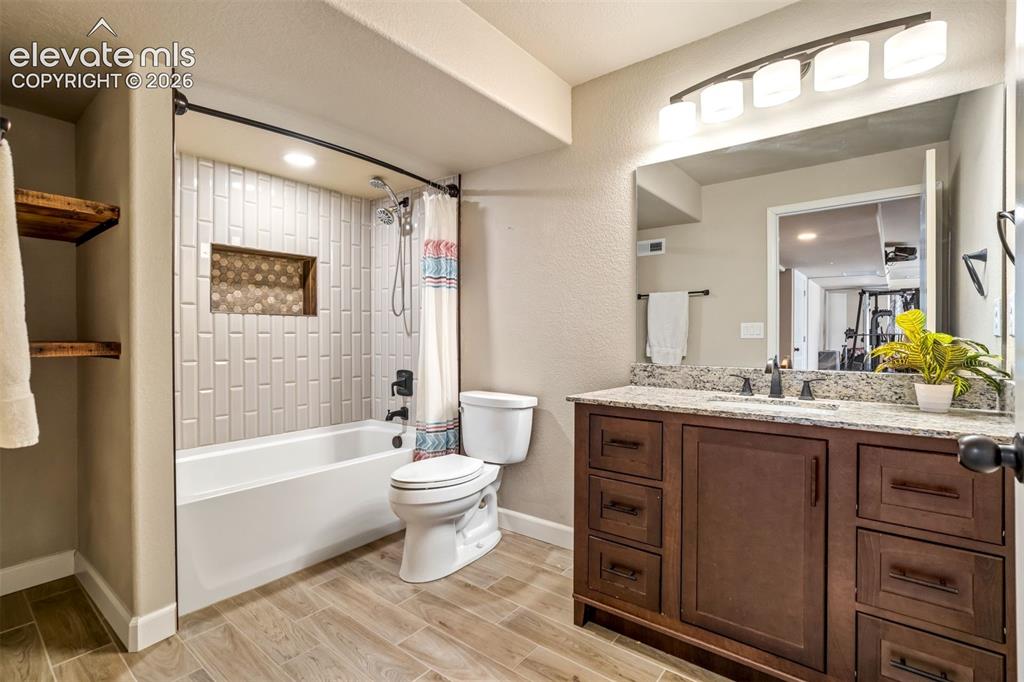 Image 38 of 47: This basement bathroom is a dream. 
