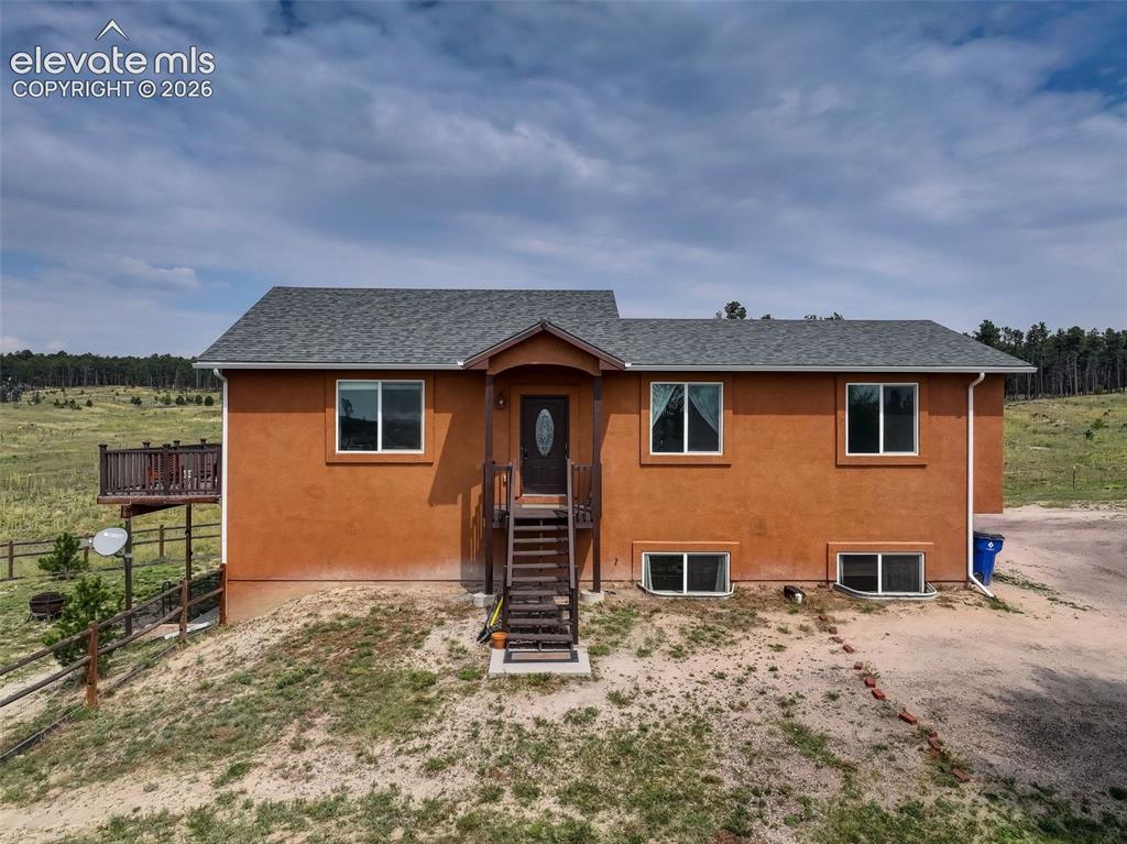 Caption: Front door faces south.