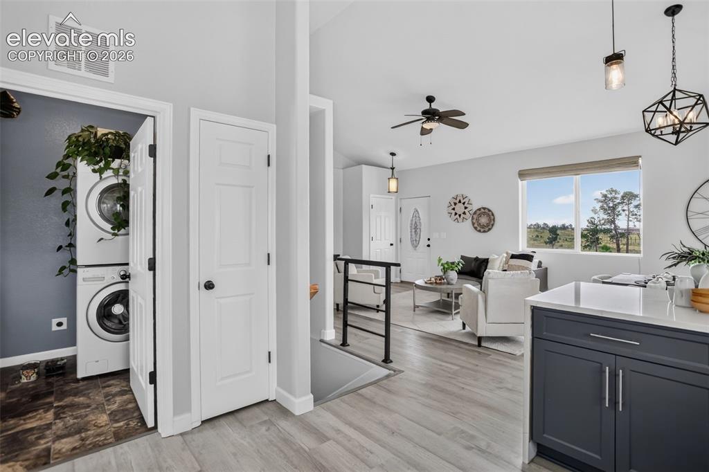 Image 16 of 50: Laundry room right off the kitchen.