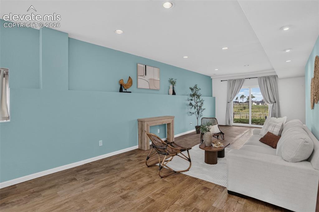 Image 29 of 50: Downstairs, large family room, game room or home theater.  Make it your own