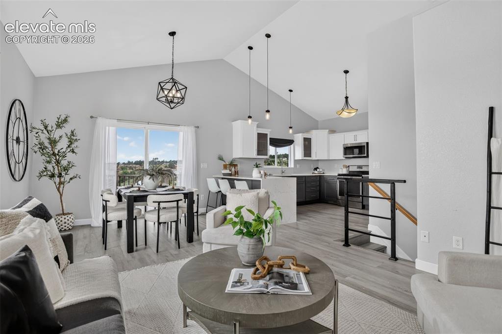 Image 3 of 50: Beautiful open floor plan with vaulted ceilings