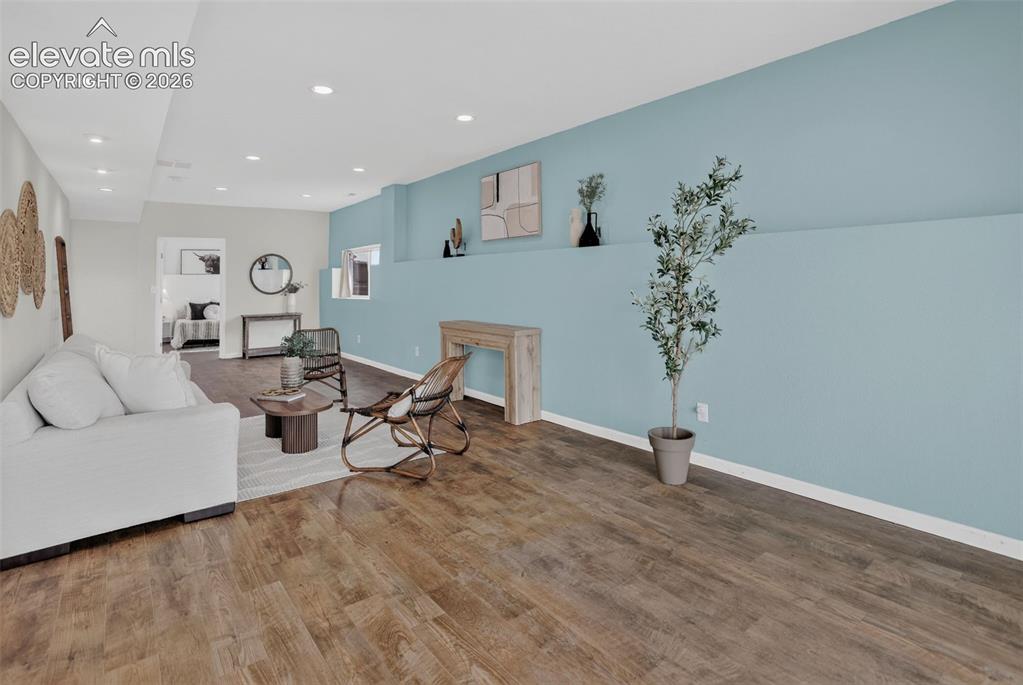 Image 31 of 50: Downstairs, large family room, game room or home theater.  Make it your own