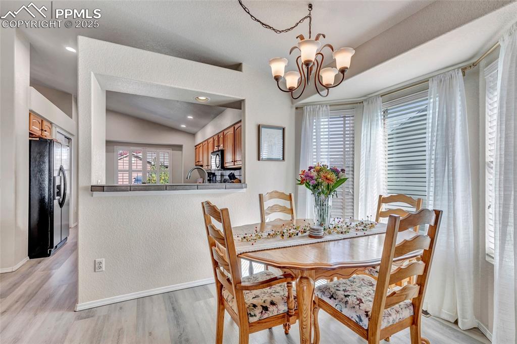 Image 10 of 23: Surrounded by windows and light — an inviting space for everything from wee