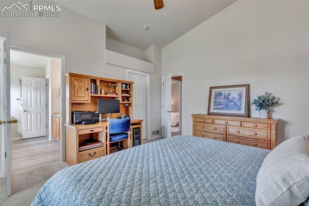 Image 15 of 23: Spacious and serene with natural light and flexible space for reading or wo