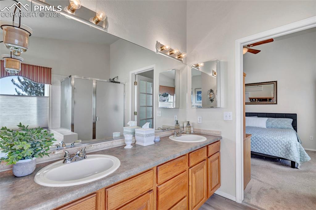 Image 17 of 23: Your personal spa with a soaking tub, walk-in shower, and private backyard 