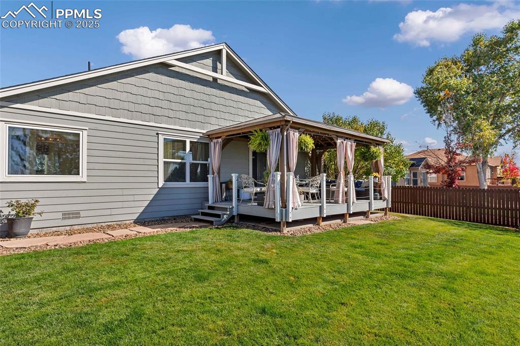 Image 21 of 23: Imagine summer dinners, fireside nights, and weekend gatherings in this inv