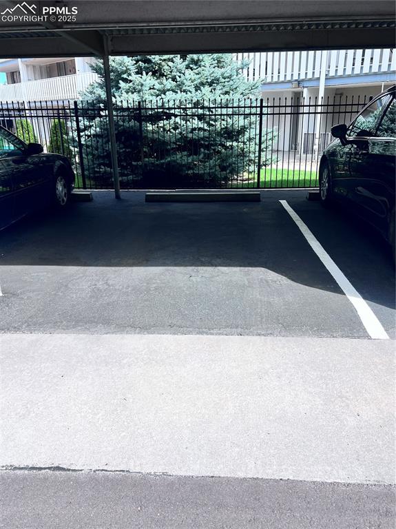 Image 32 of 33: Covered parking comes with this unit.  