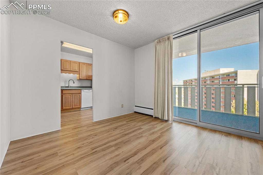 Image 4 of 14: Great room with dining living combo