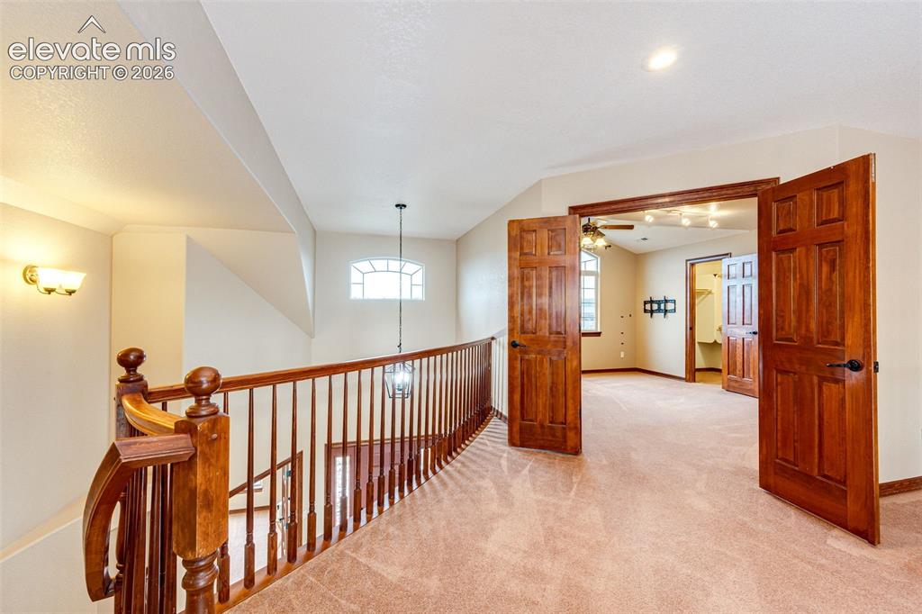 Image 19 of 47: Upstairs Ensuite Bed and Bath entry