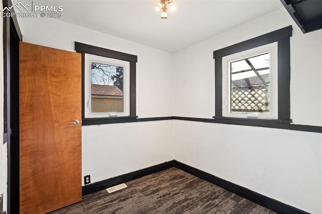 Image 26 of 30: Cottage bedroom