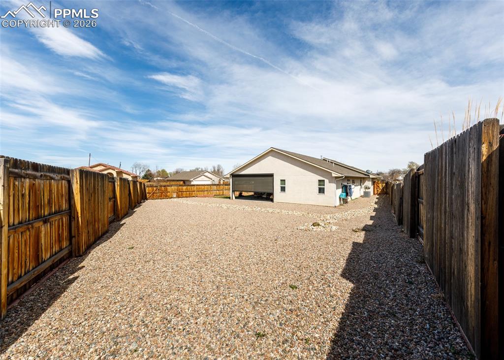 Image 36 of 38: zero scaped landscaping for low maintenance yard