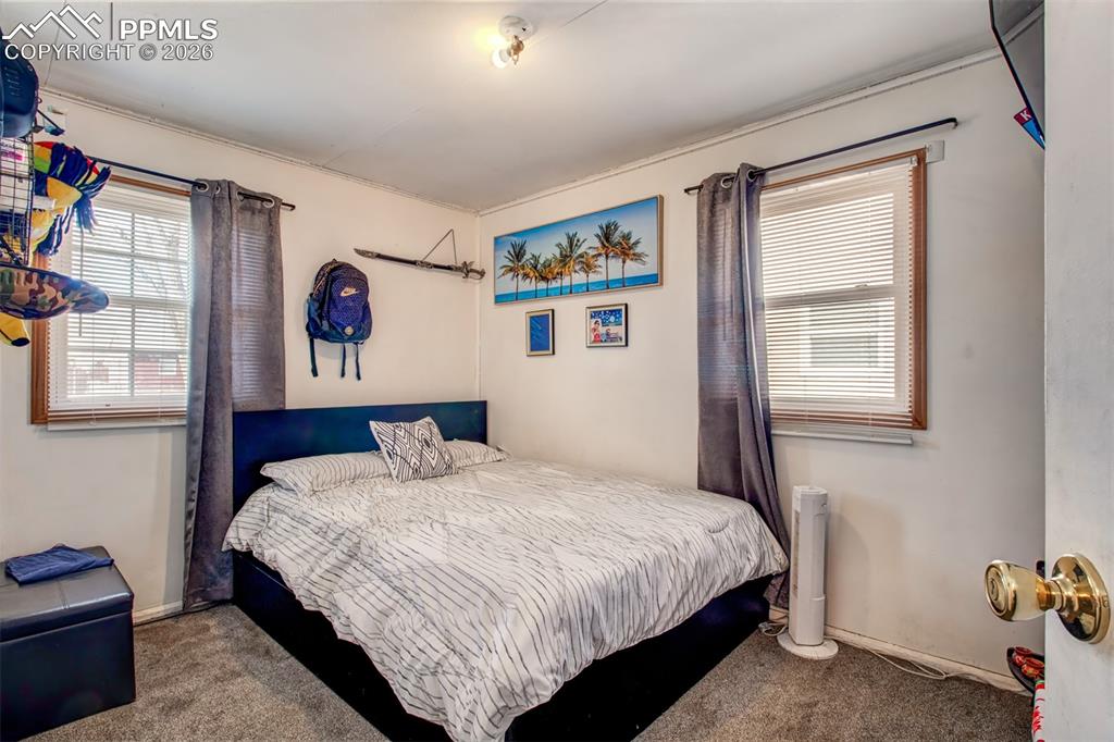 Image 13 of 21: Bedroom