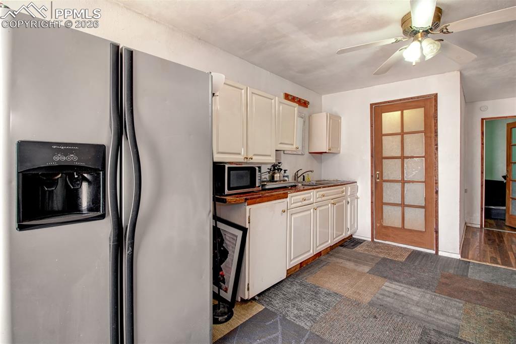 Image 18 of 21: Another view of the kitchen in the apartment