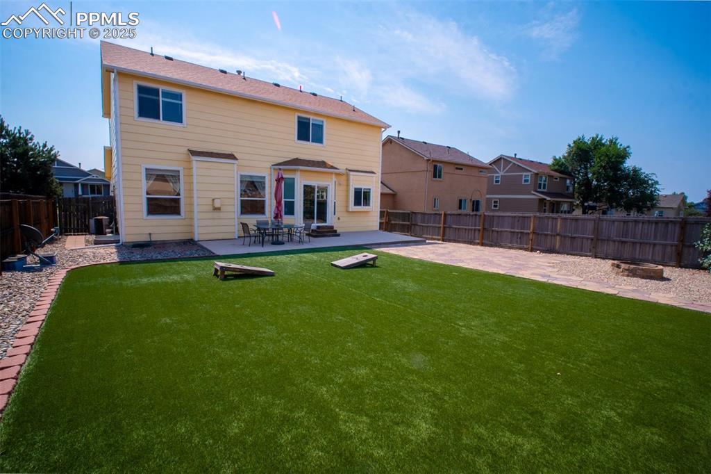Image 34 of 37: Low maintenance turf makes life that much easier, right?