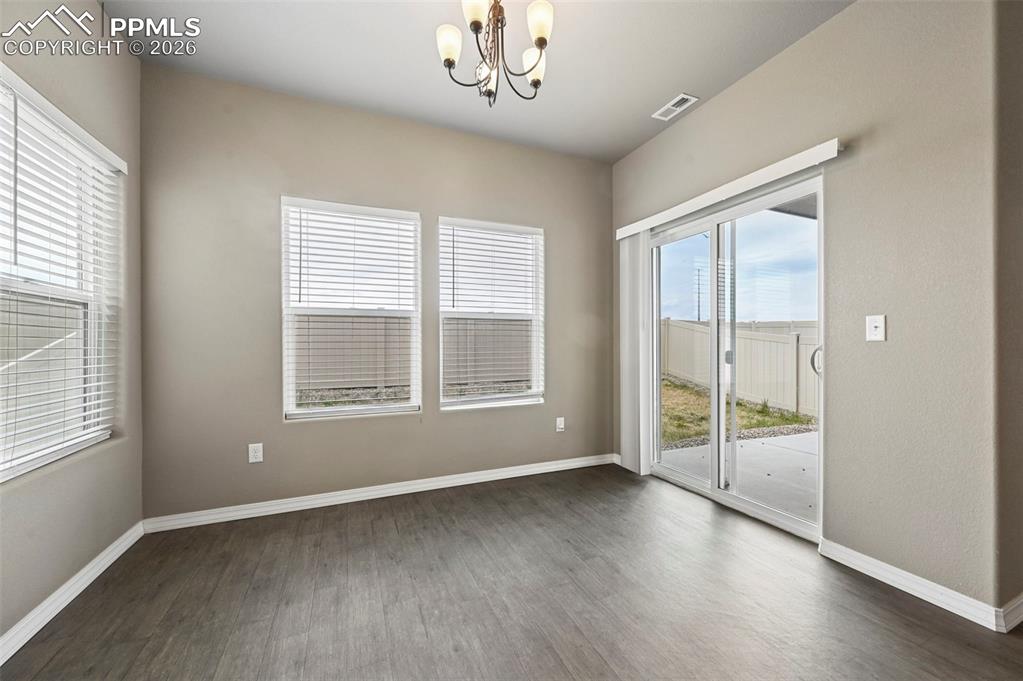 Image 12 of 36: Unstaged dining room