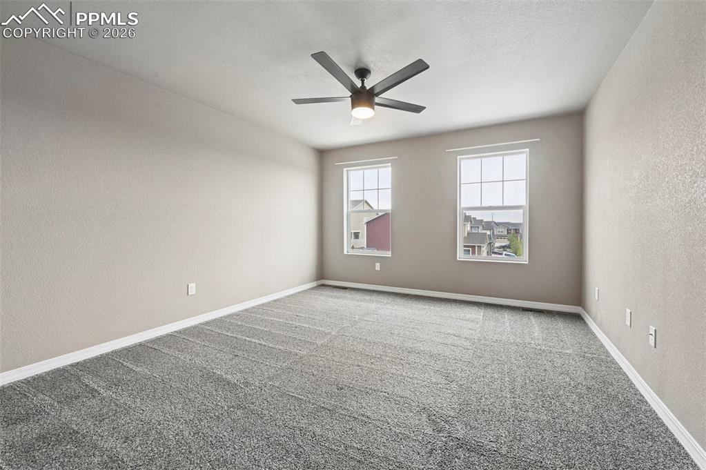 Image 19 of 36: Unstaged primary bedroom