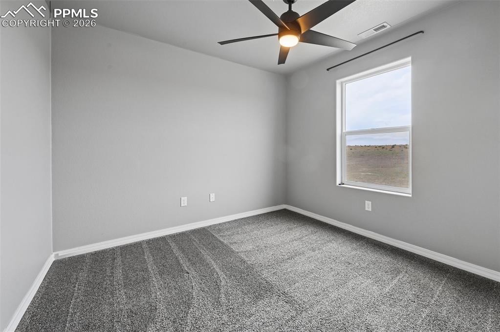 Image 26 of 36: Unstaged bedroom