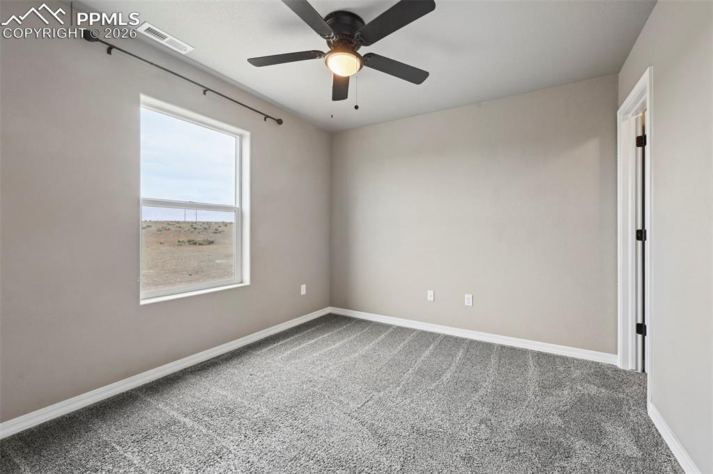 Image 28 of 36: Unstaged bedroom