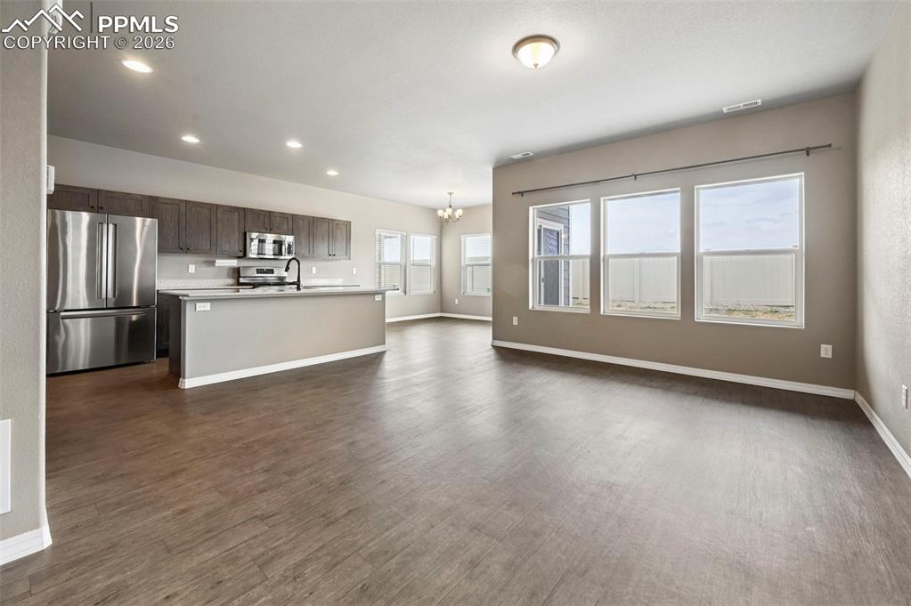 Image 6 of 36: Unstaged living room