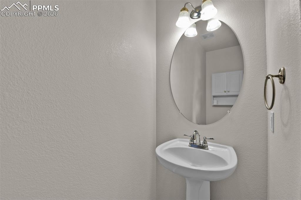 Image 16 of 49: Powder Room on Main Floor