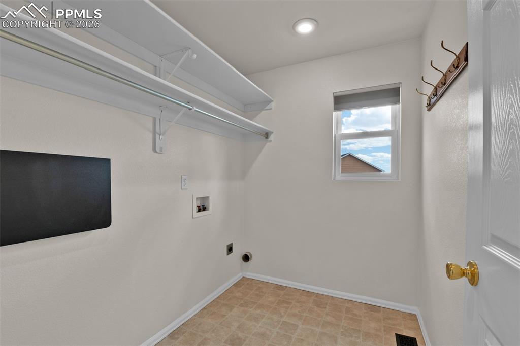 Image 17 of 49: Main Level Laundry Room