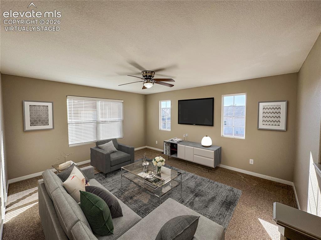 Image 19 of 42: virtually staged Neutral-toned interior featuring wall-to-wall carpeting, m