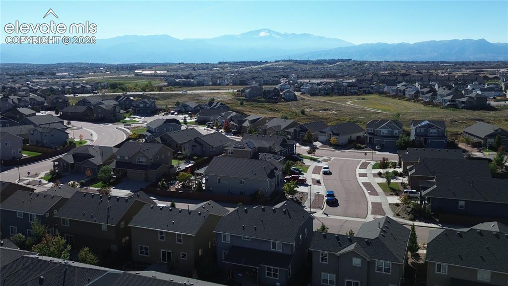 Image 4 of 42: Aerial perspective featuring residential neighborhood surroundings and a pr