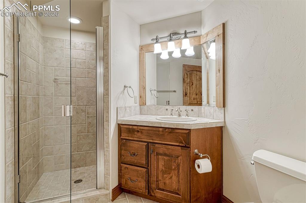 Image 29 of 50: Lower level bathroom