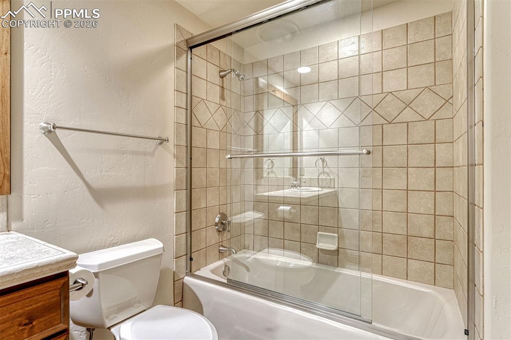 Image 32 of 50: Lower level full bathroom.