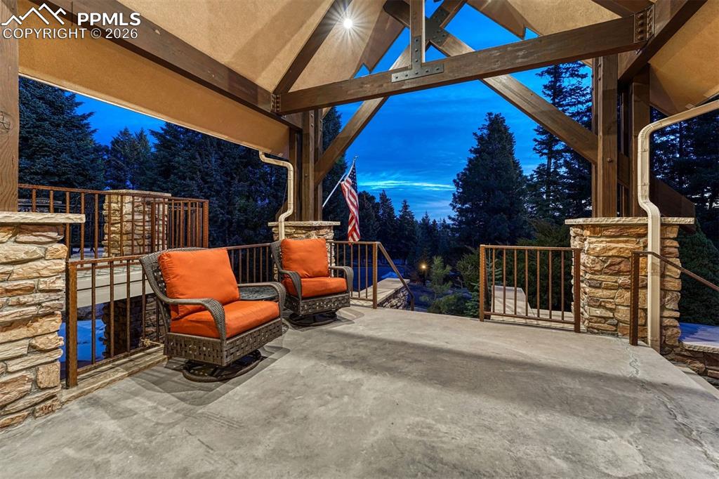 Image 46 of 50: A gracious, covered front entry that warmly welcomes guests.